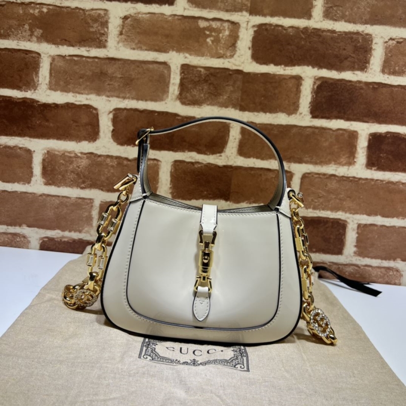 G*u*i top handle bags